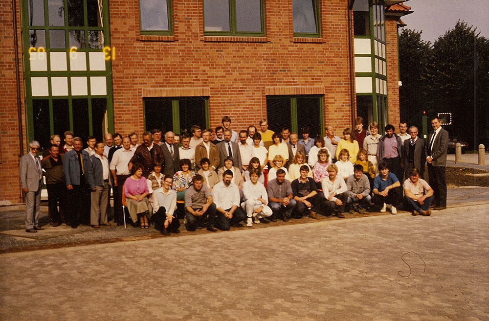Gruppenfoto der Mitarbeiter in den 80er Jahren